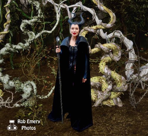 Maleficent emerging from the forest